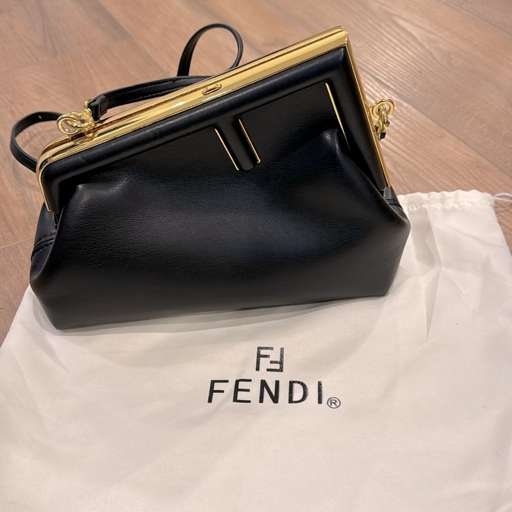 Fendi clutch purse with crossbody strap